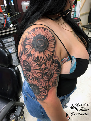 Explore female back tattoo ideas, creative tattoo ideas in San Diego, available at Wylde Sydes Tattoo & Body Piercing