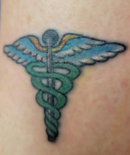 Explore tattoo ideas for shoulder cap, creative tattoo ideas in Gulfport, available at Jack & Dianes Tattoo