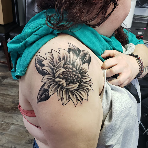 Tattoo Shop «Next Level Tattoo Company - Imlay City», reviews and photos, 420 E 3rd St, Imlay City, MI 48444, USA