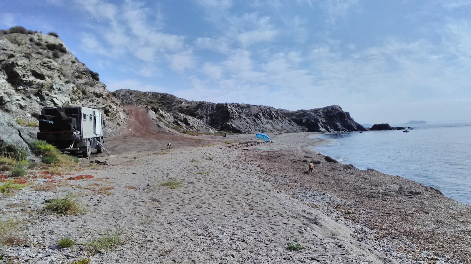 Photo of Cala Cabezo Negro with blue pure water surface