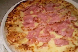 Pizzería La Nueva image