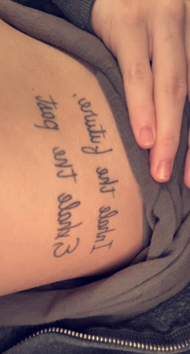 Explore no regrets tattoo ideas, creative tattoo ideas in Waterloo, available at Cedar Valley Tattoo & Piercing Studio