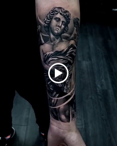 Explore slash tattoo ideas, creative tattoo ideas in Hollywood, available at Sacred Eye Tattoos