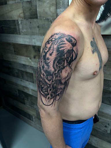 Explore enso tattoo ideas, creative tattoo ideas in Steubenville, available at Garloch Tattooing