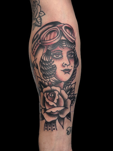 Explore black people tattoo ideas, creative tattoo ideas in Johnson City, available at Gold Cross Tattoo Co.