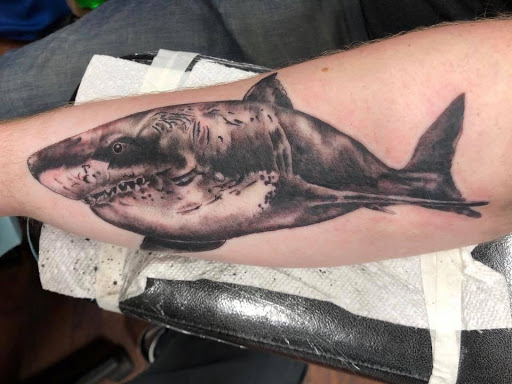 Explore no fear tattoo ideas, creative tattoo ideas in Houghton Lake, available at Screaming Eagle Tattoo