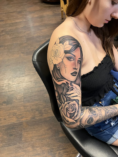 Explore fine line hand tattoo ideas, creative tattoo ideas in Bullhead City, available at Smoke and Dagger Tattoo