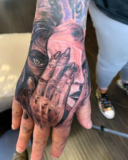 Explore rip tattoo ideas small, creative tattoo ideas in Marietta, available at Lure Tattooing & Piercing LLC