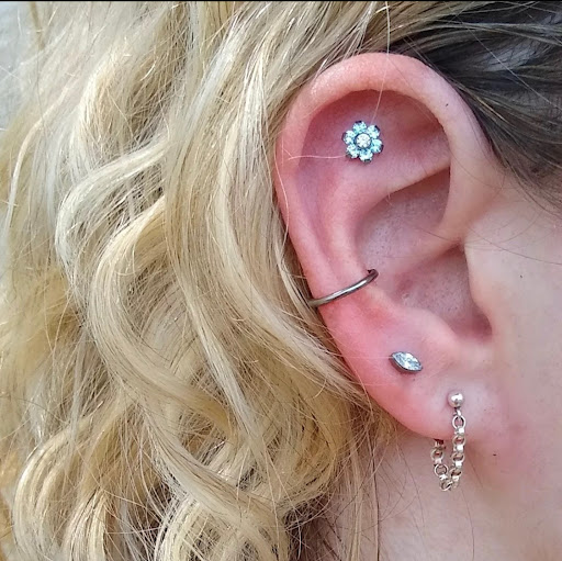 Explore scientific tattoo ideas, creative tattoo ideas in Libertyville, available at Lucky Seven Tattoo