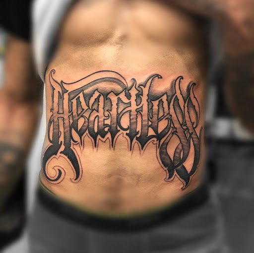 Explore unique tramp stamp tattoo ideas, creative tattoo ideas in Providence, available at Body Canvas PVD Custom TATTOO Shop