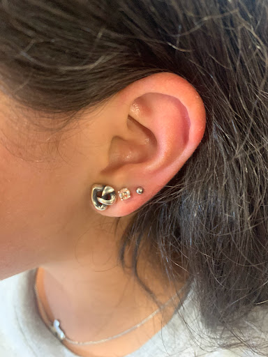 Explore feminine tattoo ideas, creative tattoo ideas in Round Rock, available at Piercings by Toni