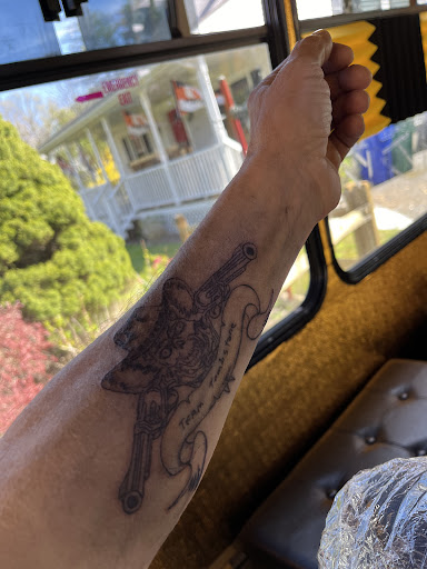 Explore rebel tattoo ideas, creative tattoo ideas in Bloomfield, available at Golden Gates Bus Mobile Tattoo Studio