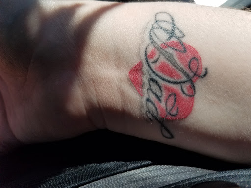 Explore tattoo ideas for men forearm, creative tattoo ideas in Sigourney, available at Octopus Ink Professional Tattoo & Piercing
