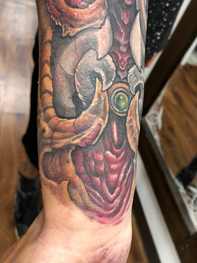 Explore hunting fishing tattoo ideas, creative tattoo ideas in Des Moines, available at Skin Kitchen Tattoo