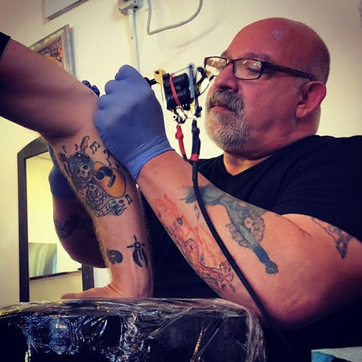 Explore chicano neck tattoo ideas, creative tattoo ideas in New Orleans, available at Catahoula Tattoo 