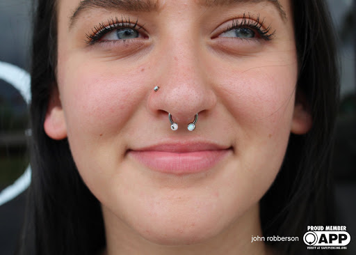 Explore husker tattoo ideas, creative tattoo ideas in Fort Myers, available at Tiger Lotus Tattoo and Piercing