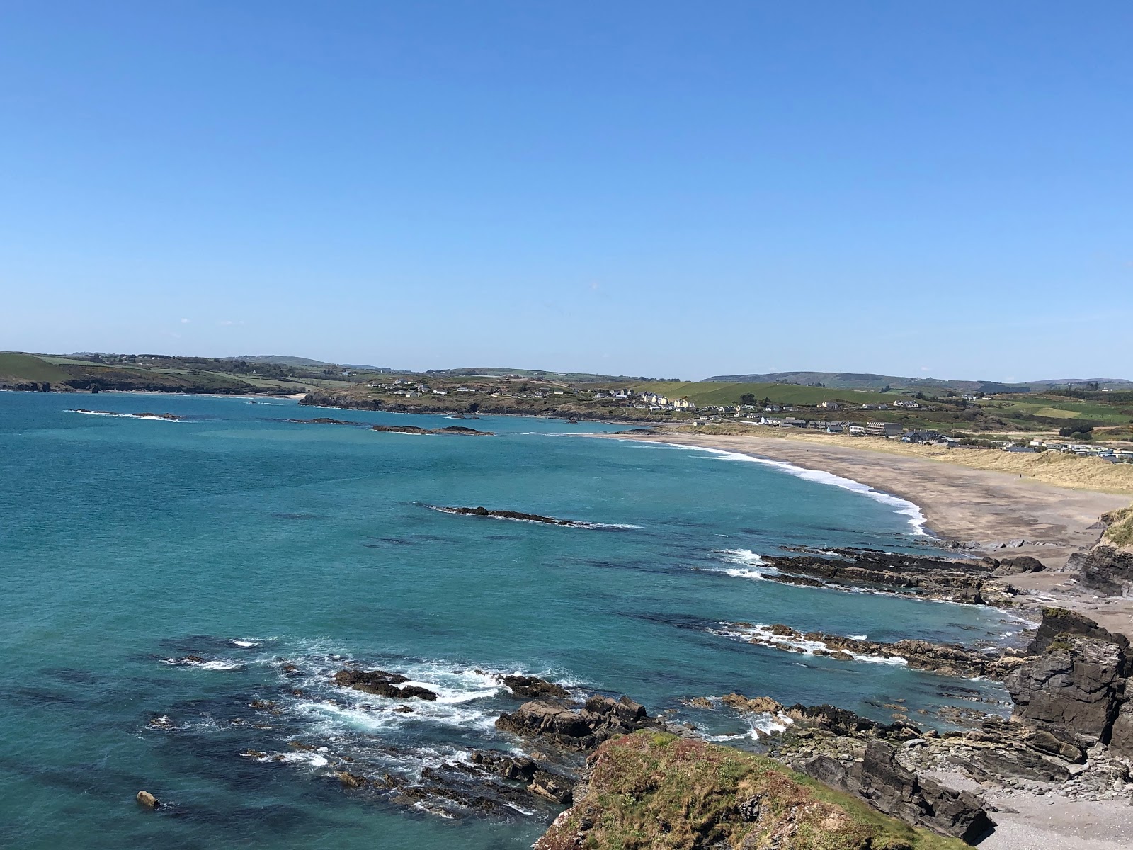 Foto di Little-Island Bay Beach con una superficie del sabbia beige e ciottoli