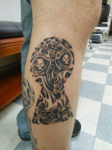 Explore maltese cross tattoo ideas, creative tattoo ideas in Bowling Green, available at Taboo Tattoos and Piercings