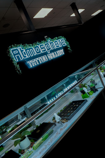 Explore tattoo word cover up ideas, creative tattoo ideas in Roselle, available at Atmosphere Tattoo Gallery - Roselle