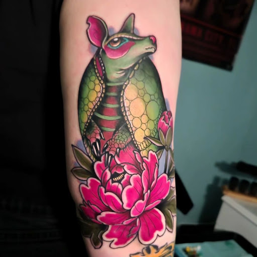 Explore leo sleeve tattoo ideas, creative tattoo ideas in Calhoun, available at A Sailors Grave Tattoo Parlor