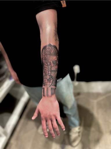 Explore hand tattoos men ideas, creative tattoo ideas in Spirit Lake, available at Castaway tattoo