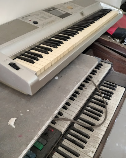 Ahli Service Piano - Organ ' Metro Musik Center '