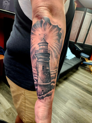 Explore ladies hand tattoo ideas, creative tattoo ideas in West Bend, available at Frenchys Tattoos & Co LLC
