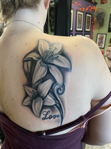 Explore dogwood tattoo ideas, creative tattoo ideas in Conroe, available at Monsters Ink, LLC