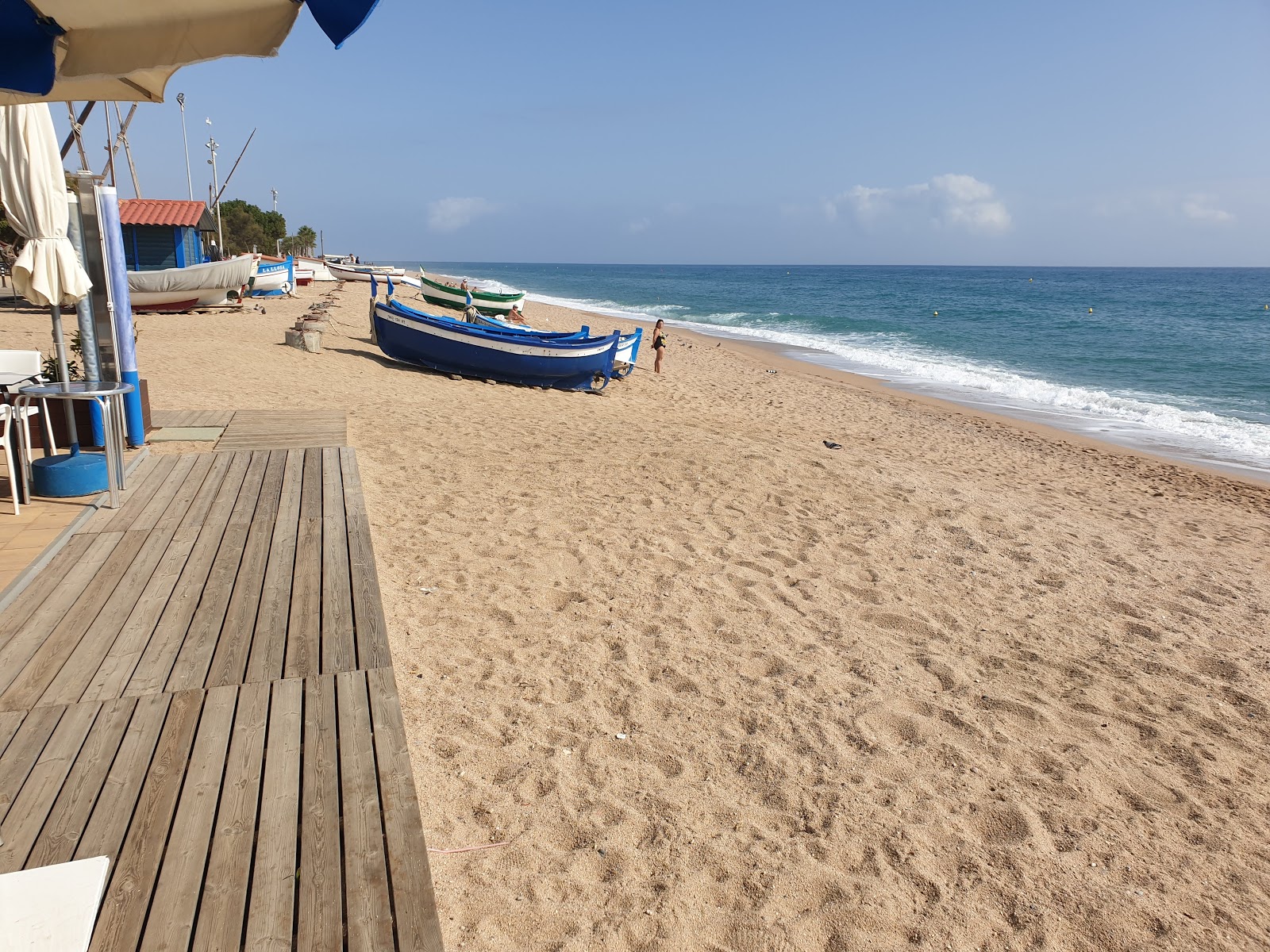 Fotografie cu Platja dels Pescadors cu o suprafață de apa turcoaz