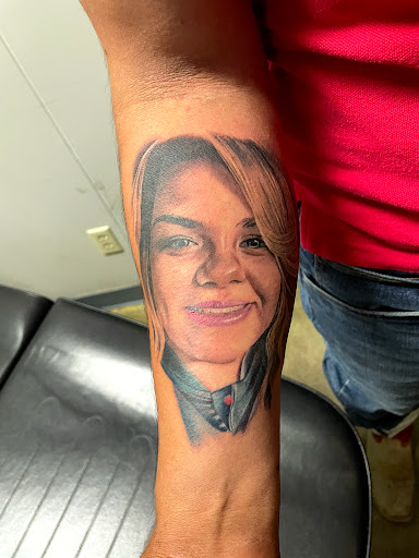 Explore hand tattoo cover up ideas, creative tattoo ideas in Dallas, available at Empire barbers & Ink