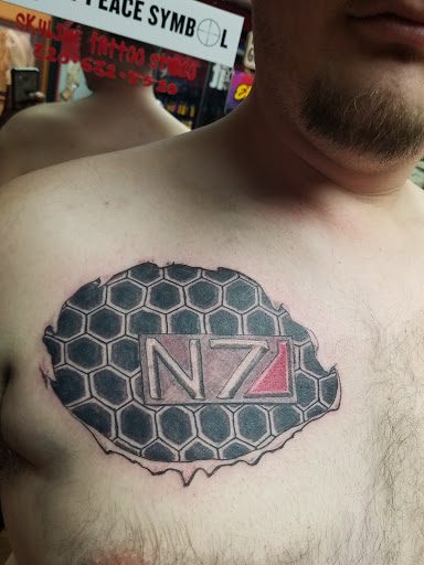 Explore st michael archangel tattoo ideas, creative tattoo ideas in Little Falls, available at Skyline Tattoo Studio