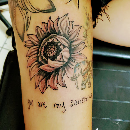 Explore unconditional love tattoo ideas, creative tattoo ideas in East Providence, available at Ink Therapy