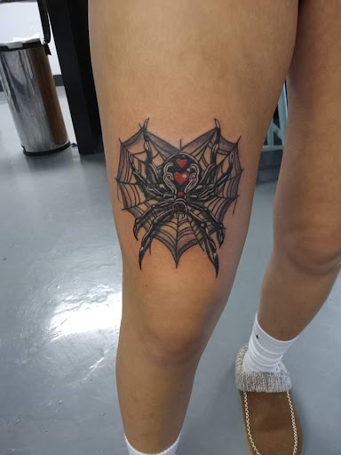Explore bite me tattoo ideas, creative tattoo ideas in Indianapolis, available at Steel Rod Tattoo