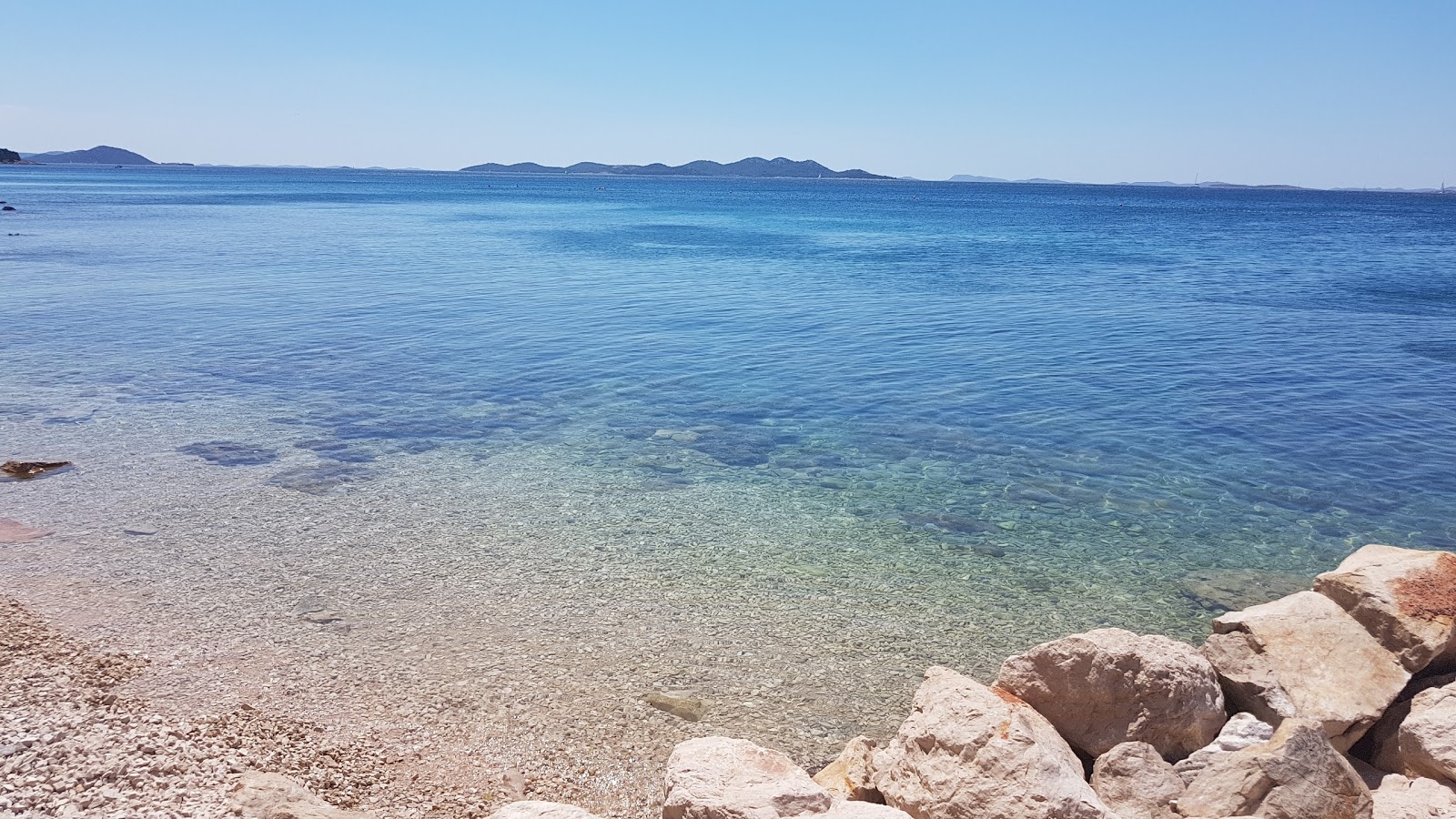 Foto av Pilatusha beach med turkos rent vatten yta
