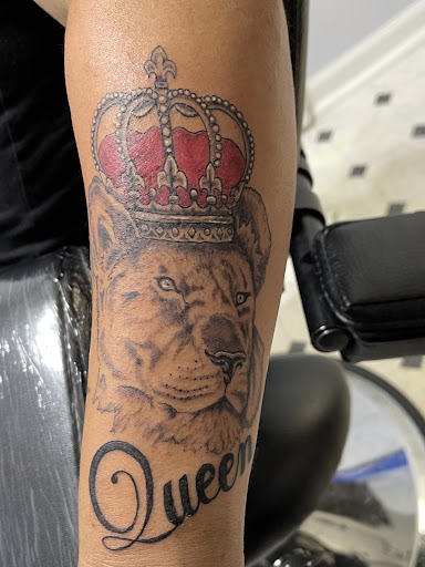 Explore dog tattoo ideas for guys, creative tattoo ideas in Orange, available at Smokin Irons Tattoo