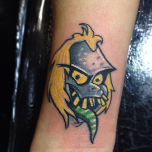 Explore bomb tattoo ideas, creative tattoo ideas in Dekalb, available at Proton Tattoo