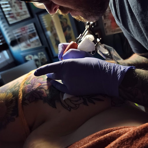 Explore quetzalcoatl tattoo ideas, creative tattoo ideas in Omaha, available at Liquid Courage Tattoos