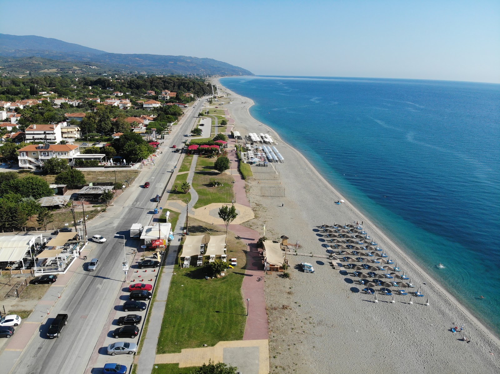 Foto av Agiokampos beach med turkos rent vatten yta