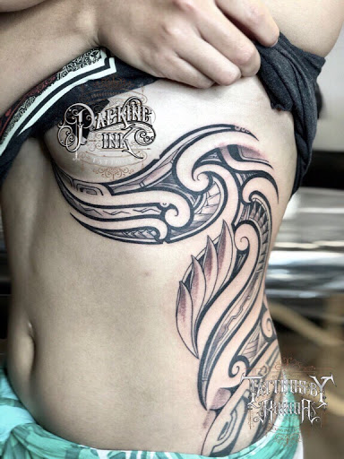 Explore nike tattoo ideas, creative tattoo ideas in Kailua Kona, available at Packing Ink Tattoos