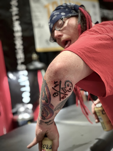 Explore throat tattoo ideas for males, creative tattoo ideas in Springfield, available at Triumph Tattoo