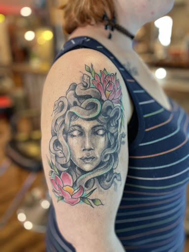 Explore female foot tattoo ideas, creative tattoo ideas in Hayesville, available at Studio 1891 Ink & Art