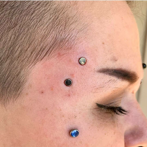 Explore timepiece tattoo ideas, creative tattoo ideas in Charleston, available at Exotic Impressions Body Piercing