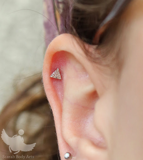 Explore tattoo ideas for women on arm, creative tattoo ideas in Syracuse, available at Scarab Body Arts