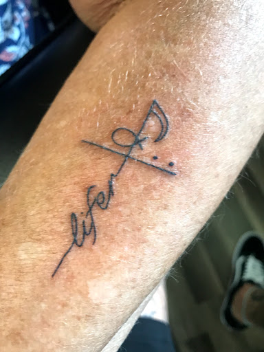 Find wolf tattoo idea for your next unique tattoo in Mount Clemens at Hand & Heart Tattoo