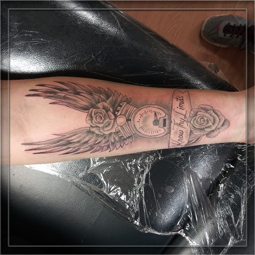 Explore mother father tattoo ideas, creative tattoo ideas in La Crosse, available at La Crosse Tattoo