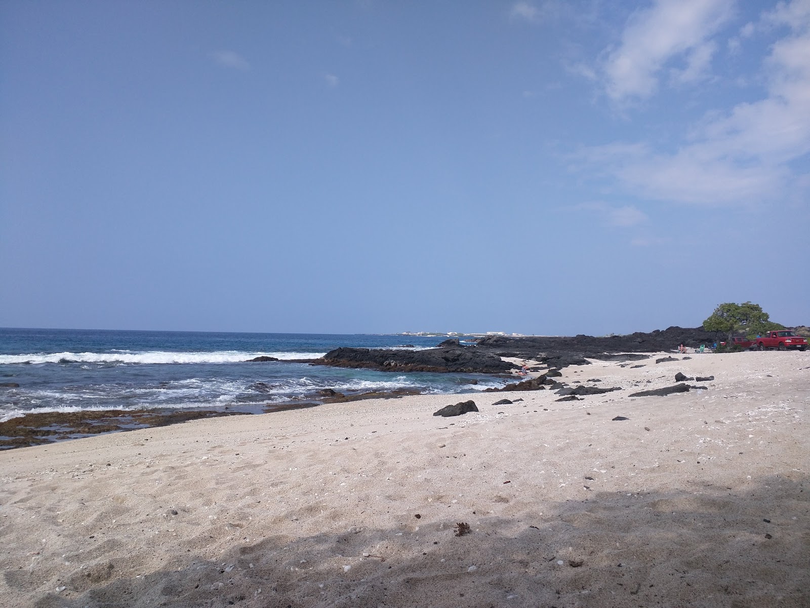 Foto van O'oma Beach met hoog niveau van netheid