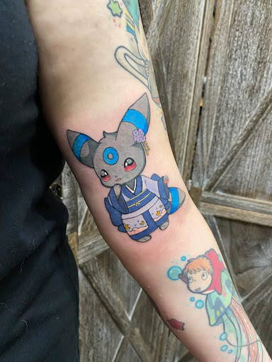 Explore hood neck tattoos ideas, creative tattoo ideas in Studio City, available at The Dolorosa Tattoo Studio