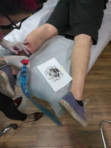 Explore chanel tattoo ideas, creative tattoo ideas in Fresno, available at Resistance Tattoo