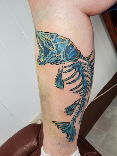 Explore halloween theme tattoo ideas, creative tattoo ideas in Hebron, available at BassAckward Studios