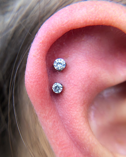 Explore april birth tattoo ideas, creative tattoo ideas in Orlando, available at Drift Piercing Studios